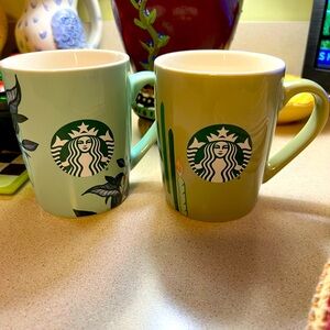 Two Starbucks Mugs